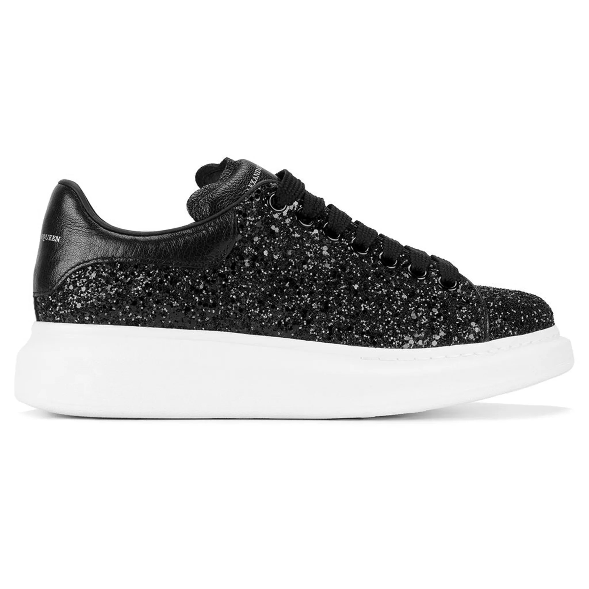 Alexander Mcqueen black glitter trainers with raised sole.